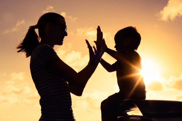 Image of happy mother and child after resolving child arrangements Swansea